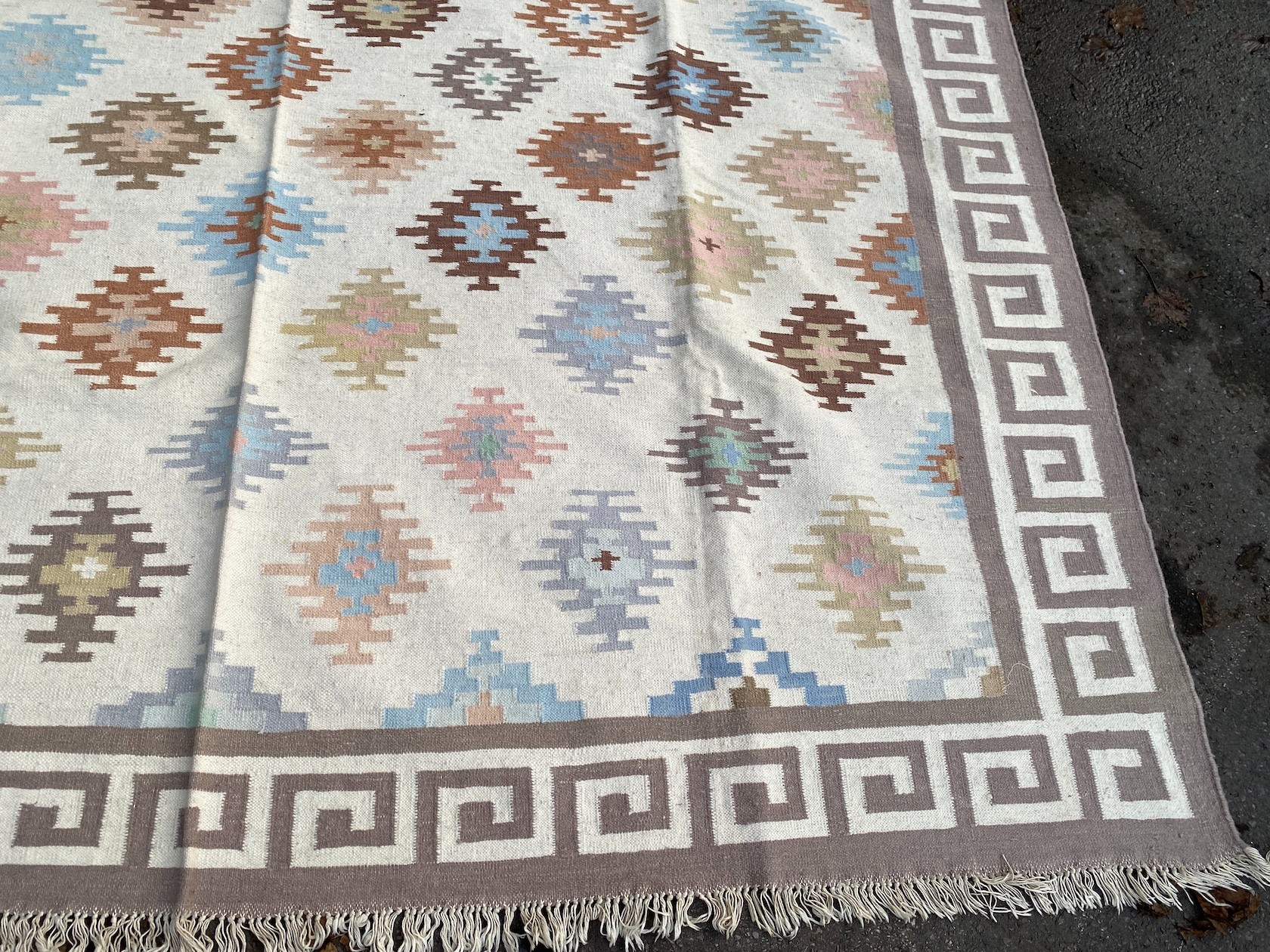 A Kilim Dhurrie polychrome flatweave carpet, approximately 360 x 280cm